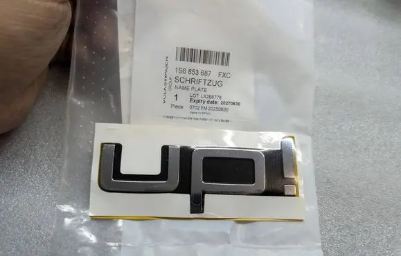 Volkswagen Up Manufacturers badge/model letters 1S6853687