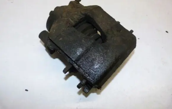 Volkswagen Golf VI Front brake caliper
