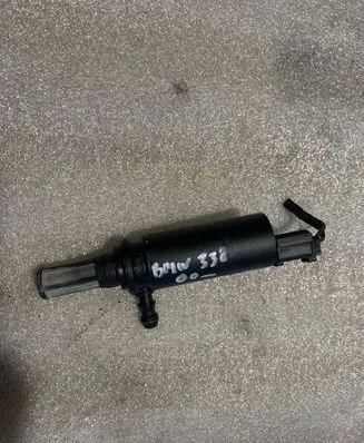 BMW 3 E46 Headlight washer pump 67128377613