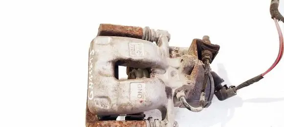 Volkswagen PASSAT B6 Rear brake caliper 