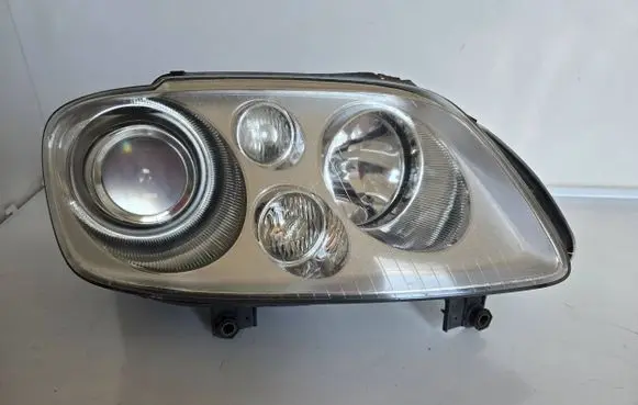 Volkswagen Touran I Headlight/headlamp 0301205272