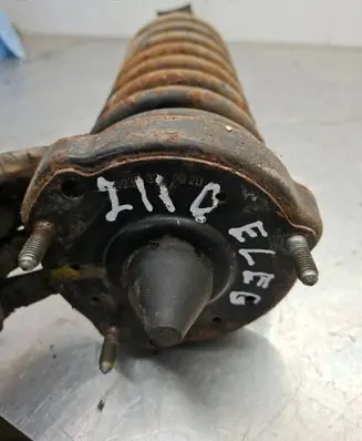 Front shock absorber with coil spring