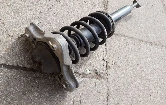 Front shock absorber with coil spring