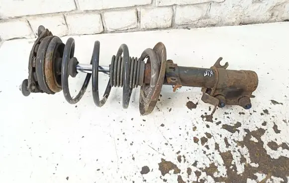 Renault Megane III Front shock absorber with coil spring