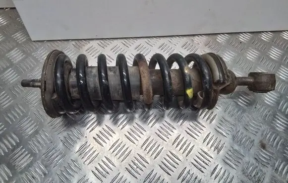 Nissan Navara D40 Front shock absorber with coil spring