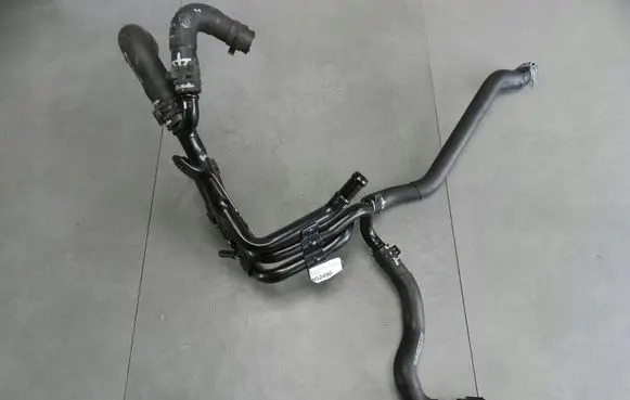 Volkswagen Jetta VI Engine coolant pipe/hose 04L121051A