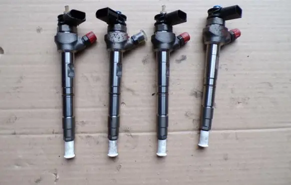 Audi A5 Fuel injectors set 05L130277E