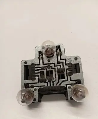 Tail light bulb cover holder