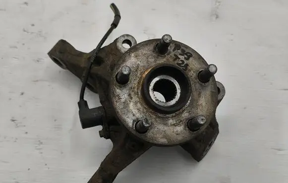 Front wheel hub spindle knuckle