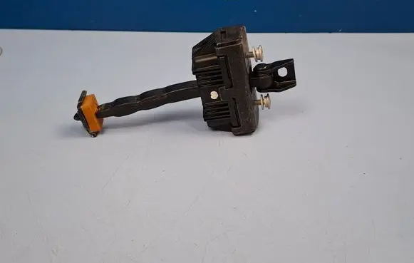 Front door check strap stopper