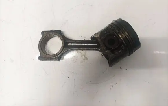Piston with connecting rod