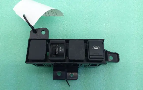 Nissan Qashqai Headlight level height control switch