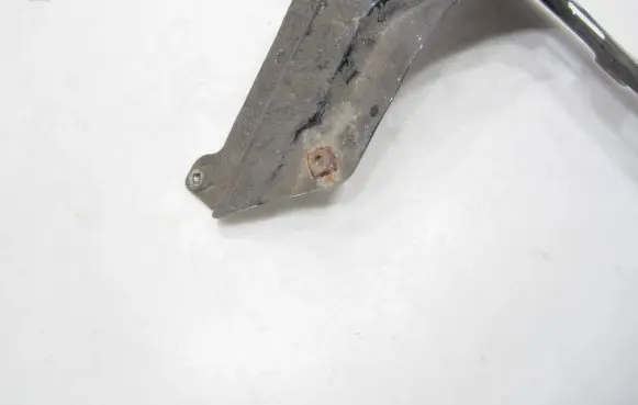 Volkswagen Touran I Fender mounting bracket 1T0821136