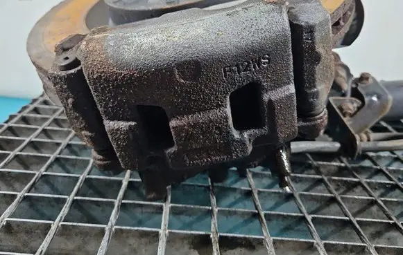 Front brake caliper