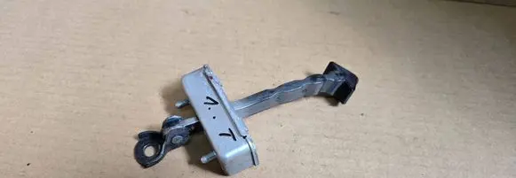 Mazda 6 Rear door check strap stopper