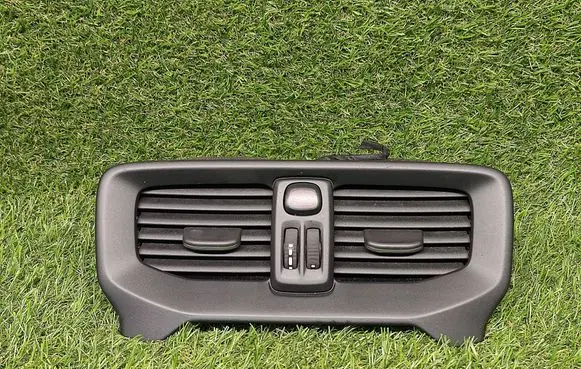 Volvo V40 Dash center air vent grill 30780845 73703000C 30780844