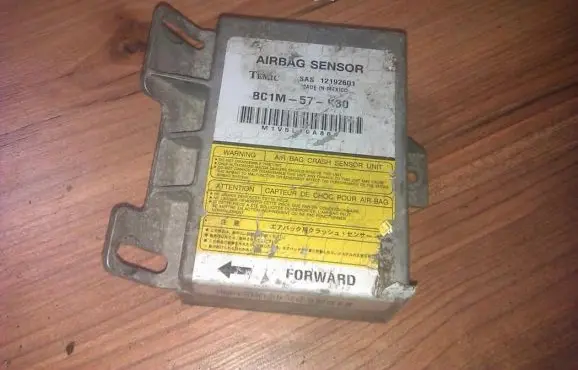 Mazda 323 Airbag control unit/module 12192601