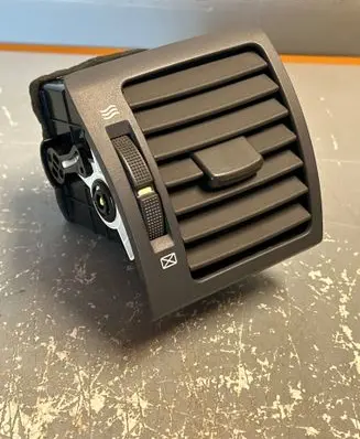 Dashboard side air vent grill/cover trim