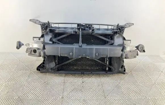 Radiator support slam panel
