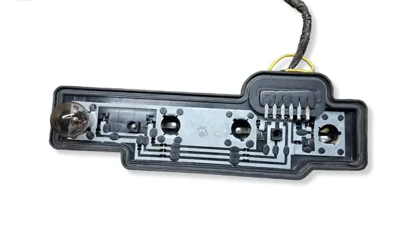 Volkswagen Caddy Tail light bulb cover holder 2K0945257A