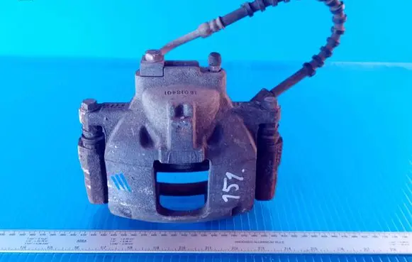 Chrysler Voyager Front brake caliper 16018401