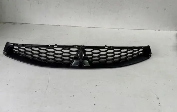 Mitsubishi Lancer X Front bumper upper radiator grill 7450b021