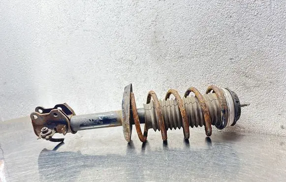 Opel Corsa D Front shock absorber with coil spring 13214354 GP27381