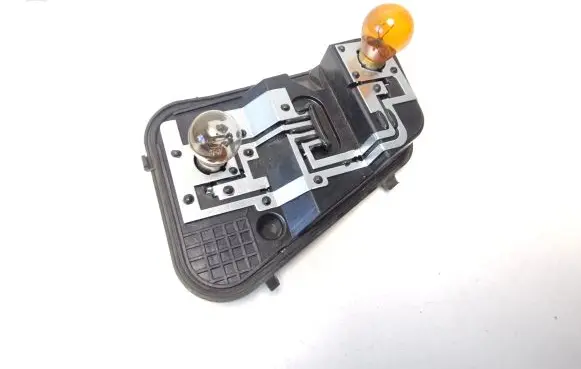 Volkswagen Touareg I Tail light bulb cover holder 7L6945258