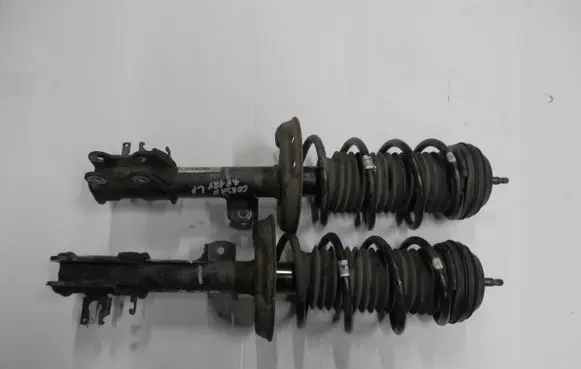 Opel Corsa D Front shock absorber with coil spring Z10XEPOE