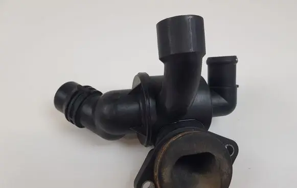 Thermostat/thermostat housing
