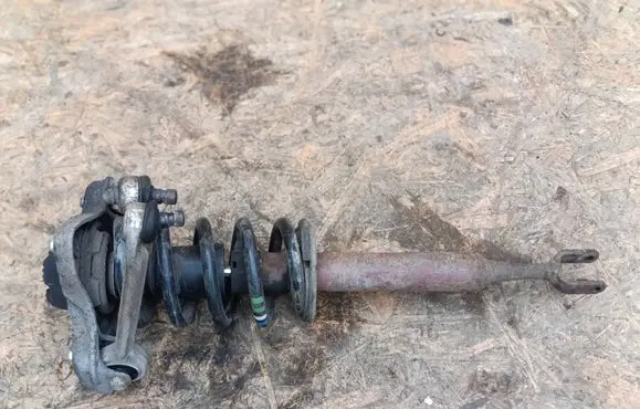 Front shock absorber with coil spring
