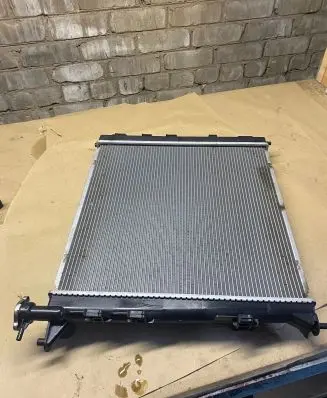 KIA Carens III Coolant radiator 2002303 550056