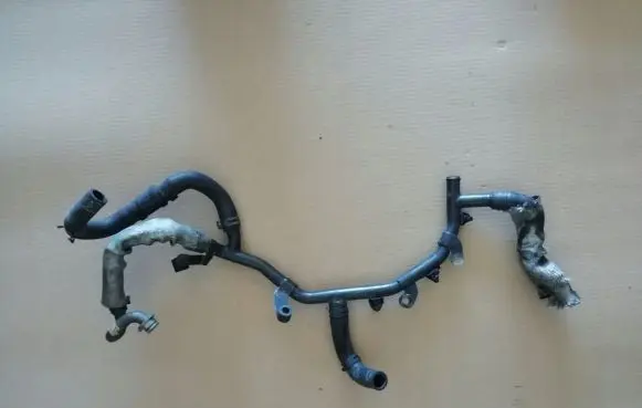 Volkswagen Touareg I Engine coolant pipe/hose 07Z121065M