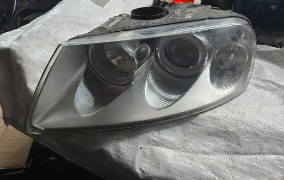 Volkswagen Touareg I Headlight/headlamp 7L6941015CE 89307871