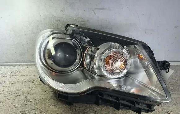 Volkswagen Touran I Headlight/headlamp 1307022697000 1307022697 1305630566