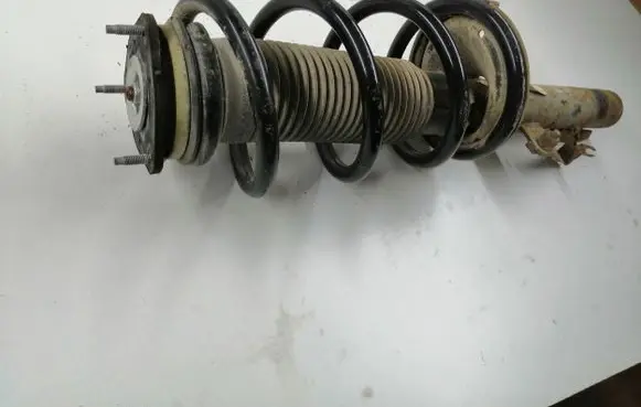 Ford Transit Front shock absorber with coil spring 6C1118045UF