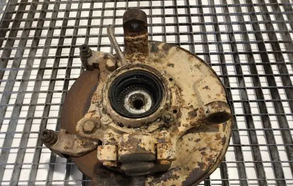 Front wheel hub spindle knuckle