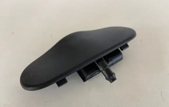 Windshield washer spray nozzle