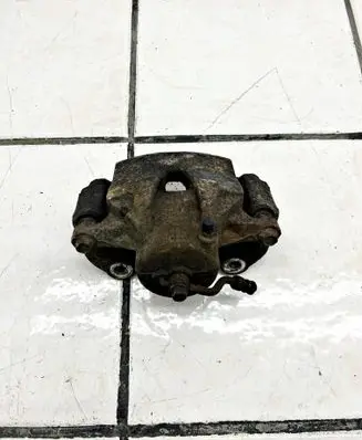 Hyundai Tucson TL Front brake caliper 