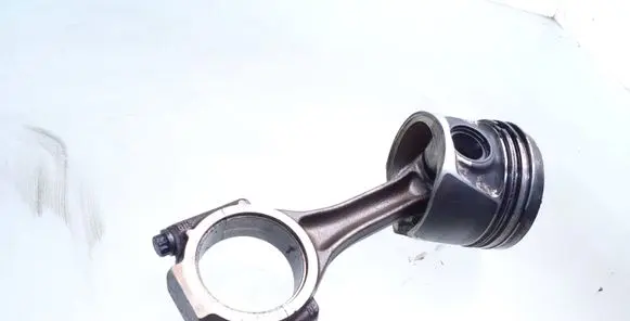 Piston with connecting rod