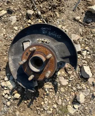 Front wheel hub spindle knuckle