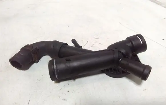 Volkswagen PASSAT CC Engine coolant pipe/hose 03L121131AA
