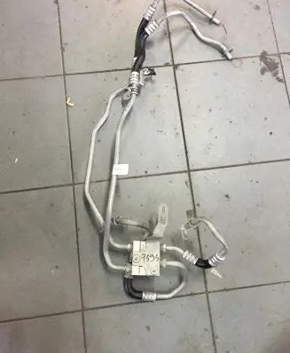 Ford Escort Air conditioning (A/C) pipe/hose F1FP-7H420-CC