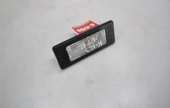 Volkswagen Jetta VI Number plate light 5N0943021