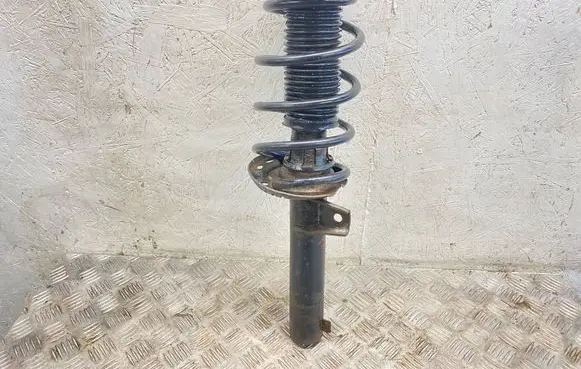 Audi Q3 8U Front shock absorber with coil spring 5N0413031AE