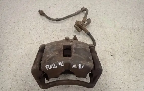 Nissan Primera Front brake caliper