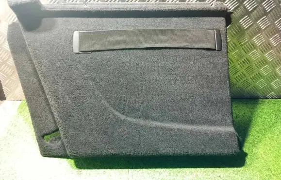 Trunk/boot lower side trim panel