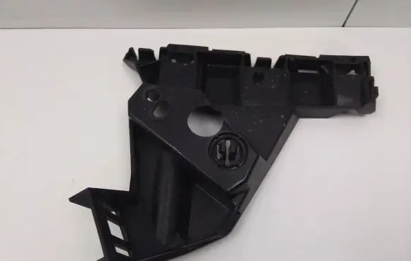 Opel Astra J Front bumper mounting bracket 13350885