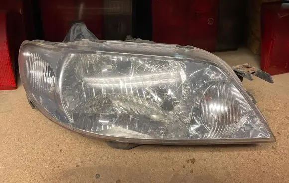 Mazda 323 F Headlight/headlamp P1364
