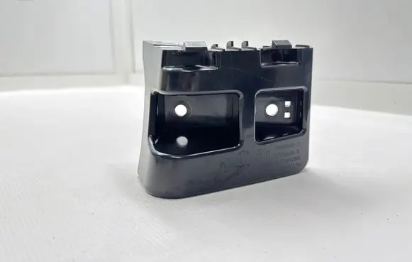 Tesla Model Y Bumper support mounting bracket corner 14940390 152575 150636900